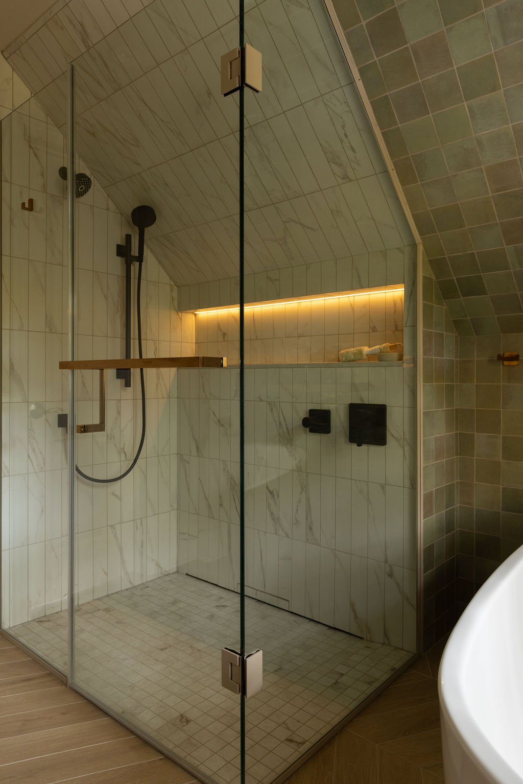Toronto Bathroom Renovation Vaulted Shower with White and Gray Marbled Tile