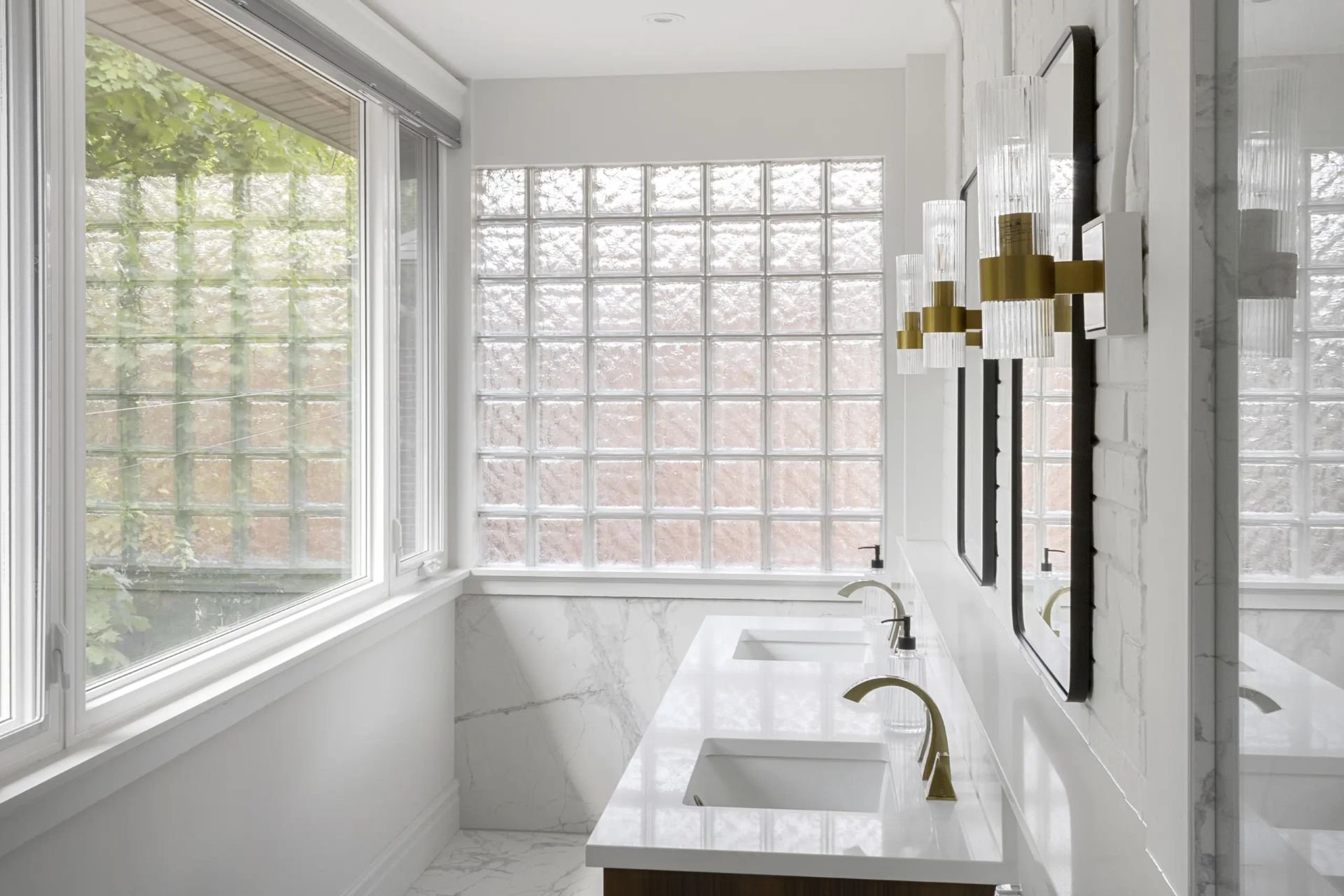 White bathroom with glass block windows