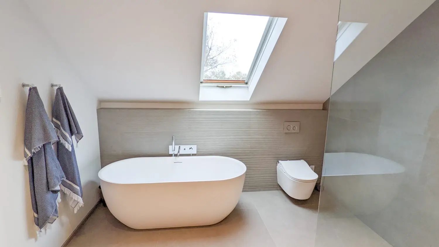third floor bathroom with standalone tub
