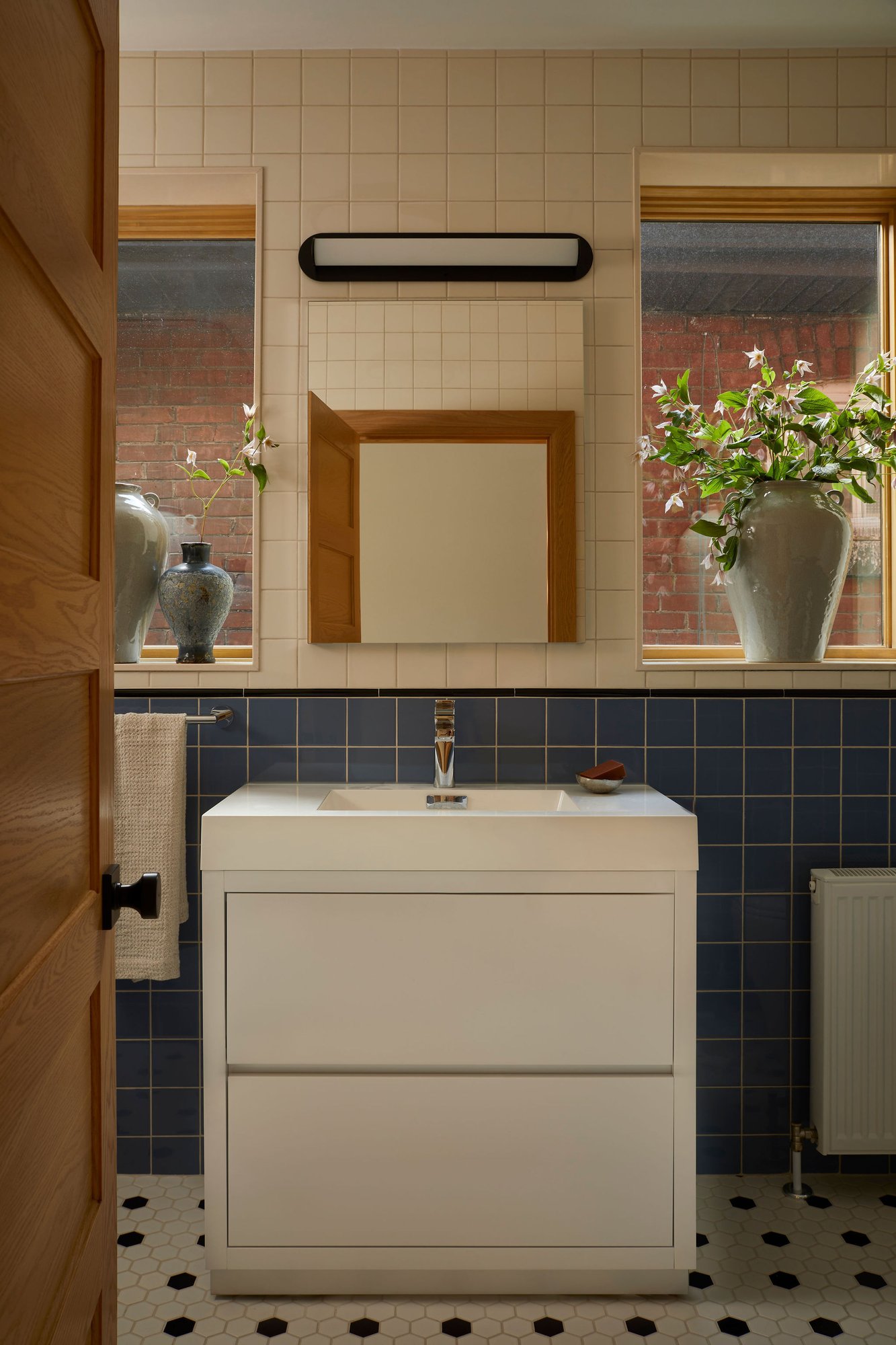 Westminster Toronto Multi-Unit Renovation Bathroom with Dark Blue Tile