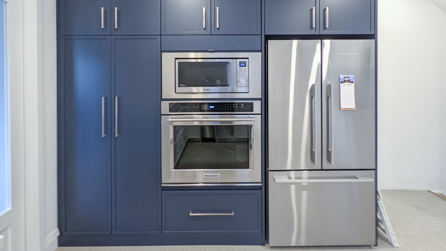 Woodbine Heights Toronto Full Gut Renovation - Custom Blue Kitchen Cabinets and Stainless Steel Appliances