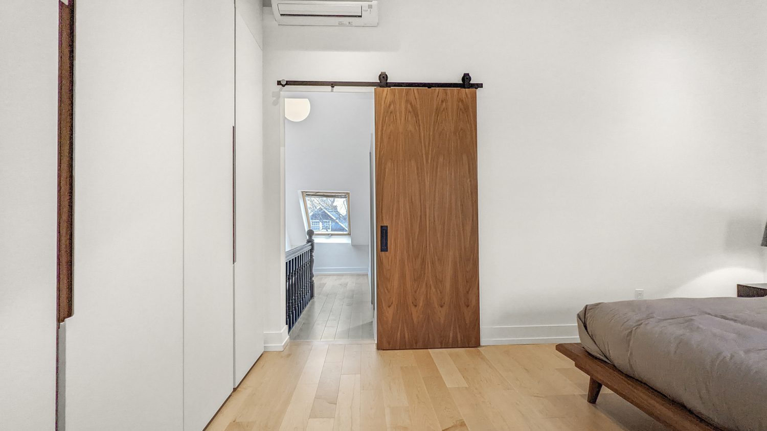Parkdale, Toronto home renovation, third floor bedroom, custom wood door